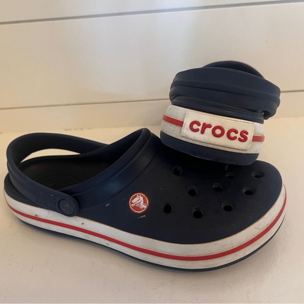 Crocs size J 6, blue, white sole red stripe